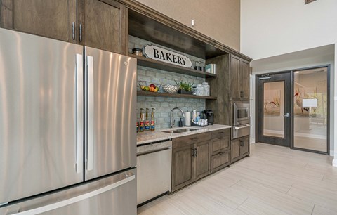Clubhouse Kitchen at Heron Ridge 62+ Apartments, Kissimmee, 34746